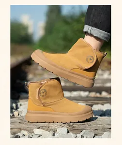 Durable tan brown men's safety work boots with reinforced non-slip soles for site use.
