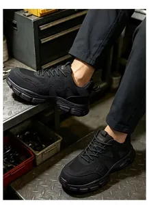 Zapatos de seguridad negros con punta de acero y suela antiperforación industrial