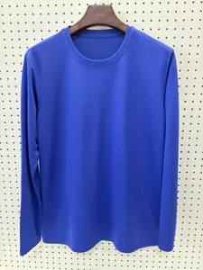 Front view of solid blue long-sleeved athletic t-shirt with breathable waffle texture