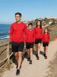 Family matching set of red long-sleeve athletic t-shirts for outdoor sports activities.