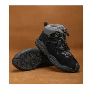 Detailed view of men's black winter snow boots with warm grey faux fur lining