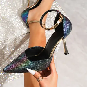 Close-up of iridescent scale-textured pointed-toe high heel sandal with ankle strap