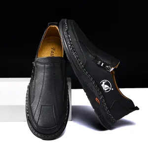 Black men's casual leather shoes with handmade stitching and side zipper detail