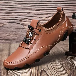 Casual bruine leren driving loafers voor heren met zachte zolen en sierstiksels