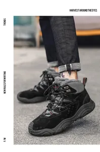 Detailed view of black men's winter snow boots with warm faux fur lining