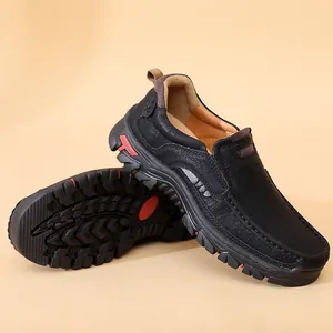 Close-up of black men's casual shoes showing soft anti-slip rubber sole and side profile.