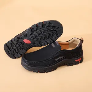 Men's black casual slip-on shoes with durable anti-slip outdoor sole detail.