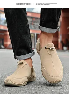 Close-up of beige casual outdoor shoes for men with sturdy rubber soles