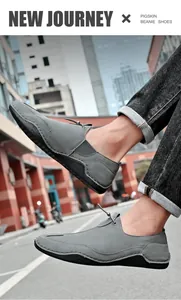 Close-up view of men's grey octopus-sole casual shoes shown in an outdoor urban setting.