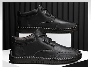 Side detail of black men's leather casual boots with decorative hand-stitched sole