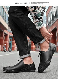 Detailed view of men's black leather casual shoes with non-slip octopus sole outdoors