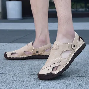 Detail showing handmade stitching on men's khaki breathable casual leather sandals