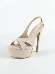 Elegantes sandalias beige con tacón de aguja y plataforma para fiesta