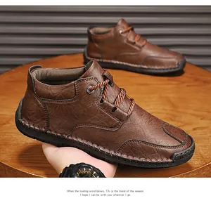 Detailed view of men's brown leather casual boots with stitching and durable sole