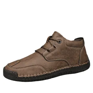 Durable brown men's casual ankle boots featuring textured leather and thick rubber soles