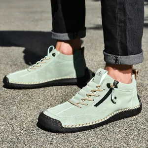Sage green men's low-top casual boots with side zipper and contrast stitching