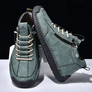 Detail of blue men's casual Martens boots with side zipper and durable rubber sole