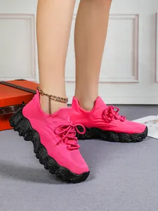 Modische, atmungsaktive Flyknit-Sneaker in Pink für Damen mit glitzernder schwarzer Sohle