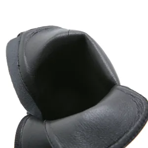 Close-up of the interior lining and collar of black high heel leather platform boots