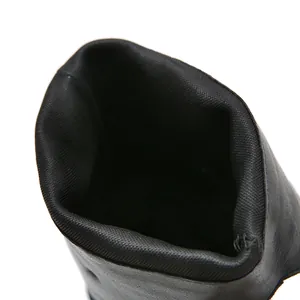 Close-up detail of the breathable mesh lining and opening of black retro western boots