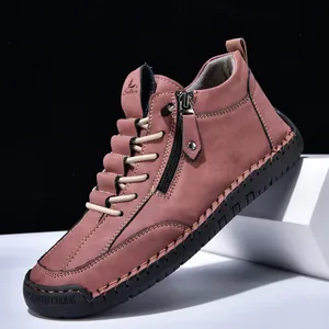 Men's brown suede mid-top Martin boots with side zipper and durable black rubber sole.