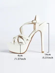 Elegant white platform sandals featuring a 5.51-inch stiletto heel and cross straps.