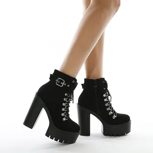 Sexy black platform ankle boots with chunky high heels and buckle details.