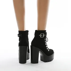 Stylish black platform ankle boots with high block heels and decorative silver buckles