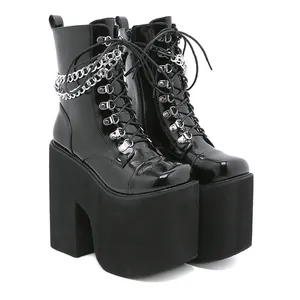 Gothic black patent leather platform ankle boots with silver chains and thick block heels