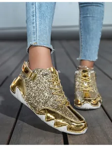 Detailed view of shimmering gold glitter high-top octopus sneakers for men and women