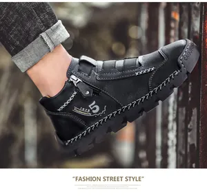 Side view of black high-top leather casual shoe with zipper and white stitching
