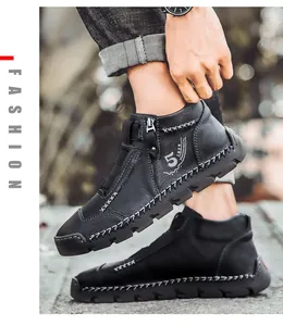 Detail of men's black high-top leather casual shoes with zipper and stitching
