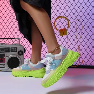 Stylish platform chunky sneakers in vibrant multi-color patchwork, comfortable dad shoes