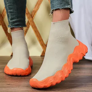 Breathable mesh sock sneakers with chunky orange wave sole and stylish beige knit upper