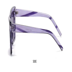 Seitenansicht der trendigen lila Cat-Eye-Sonnenbrille mit transparentem Rahmen