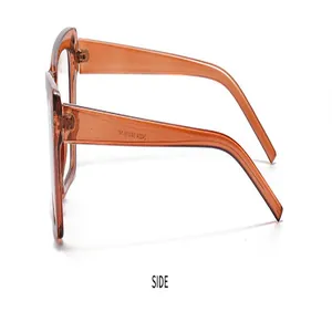 Seitenansicht der trendigen bernsteinfarbenen Katzenaugen-Sonnenbrille mit Detail-Design.