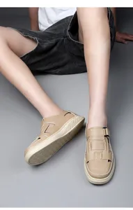 Detail view of breathable beige men's handmade casual sandals with a thick sole