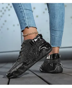 Close-up of black glitter high-top octopus leisure boots with LDECK strap detail