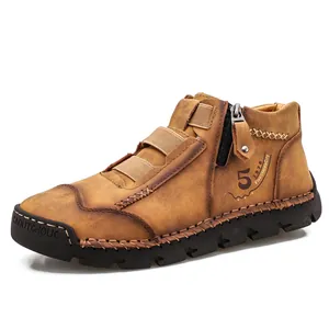 High-top brown men's casual leather boots featuring side zipper and hand-stitched details