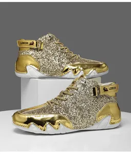 Detailed side view of high-top gold glitter shoes with octopus-style soles and LDECK logo strap