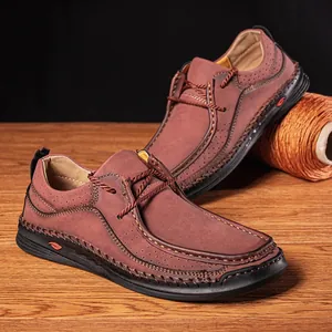 Close-up of premium handmade burgundy leather loafers for men with durable sole