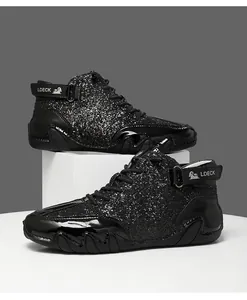 Detail view of black glitter high-top boots featuring LDECK strap and octopus sole design