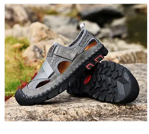 Detail view of breathable mesh and cowhide leather closed-toe outdoor sandals for men