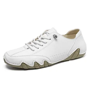 Casual men's white leather loafers featuring a unique wave-like octopus rubber sole