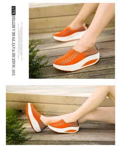 Detailansicht handgewebter, atmungsaktiver orangefarbener Damen-Slipper-Laufschuhe