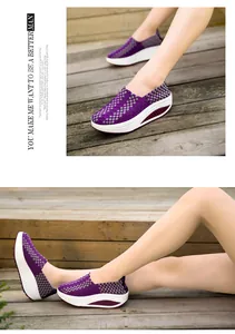 Detailansicht der lila gewebten atmungsaktiven Wanderschuhe mit Rocker-Plattform