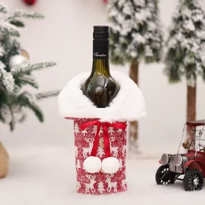Red knitted Christmas wine bottle cover with white fur collar and reindeer pattern