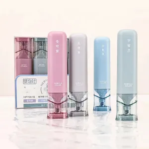 Set of 4 galaxy-themed glitter highlighters with pastel bodies and sparkle ink