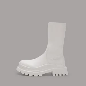 Detailed profile view of white thick sole mid-calf elastic Martin boots with lug sole