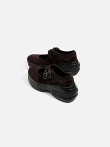 Side view of dark brown suede Mary Jane shoes with double buckles and platform soles